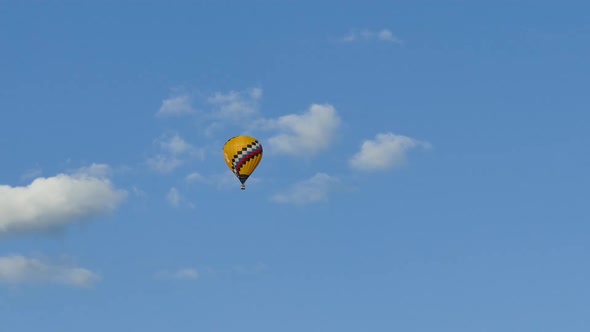 Hot air balloon soars in the sky