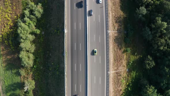 Smooth Flight Over the Autobahn  Car Traffic on the Track Section  Top View Static Shot