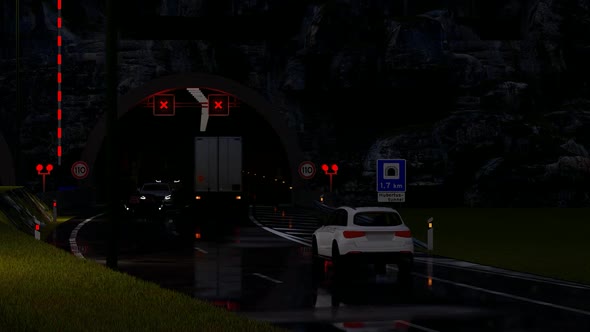 Vehicle Traffic near the Tunnel Entrance at Night
