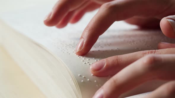 Blindman Reading Braille Book Using His Fingers Poorly Seeing Person Learning to Read Disabled