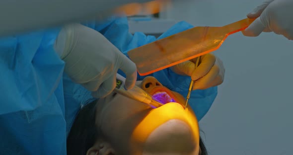 Woman undergo dental check up in clinic