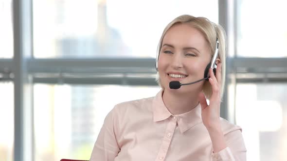 Cheerful Lady Working in Call Center.