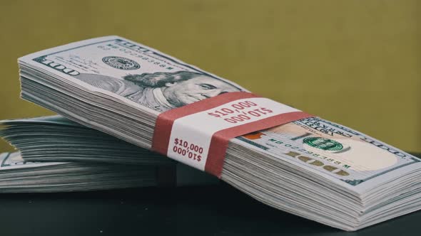 Dollars Bundles Rotate on Green Background Heap of Money