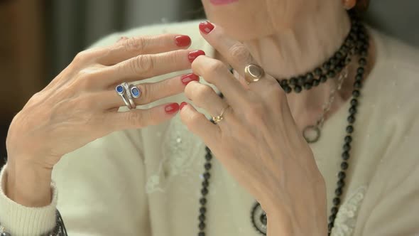 Manicured Hands with Luxury Jewelry.
