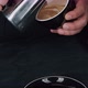 Barista pouring milk in hot coffee and making cappuccino foam in cafe close up, vertical - VideoHive Item for Sale