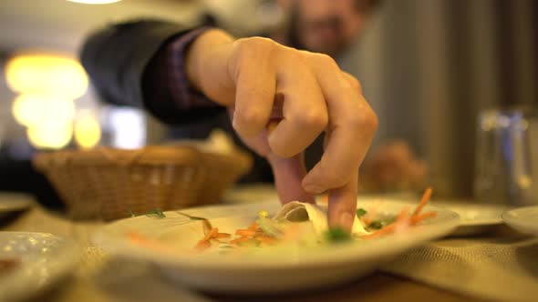 Eating Salad At Restaurant