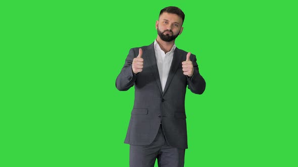 Рandsome Bearded Business Man Thumbs-up on a Green Screen, Chroma Key.