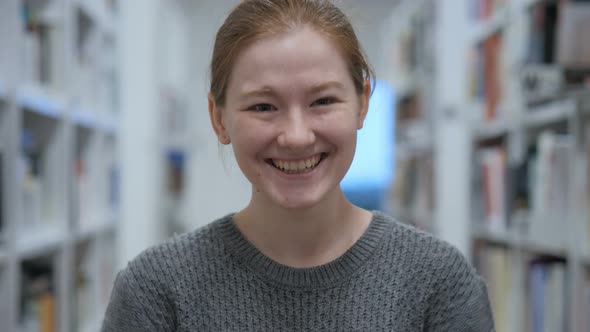 Portrait of Happy Young Woman Celebrating Success