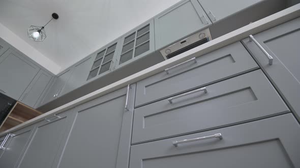 Low Angle View of Furniture at Modern Classic Gray Kitchen