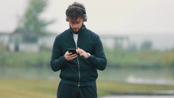 Man Listening to Music with Headphones