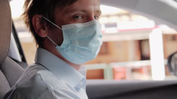 Portrait of Man Taxi Driver Wearing Protective Medical Mask Post Covid Coronavirus Quaranatine