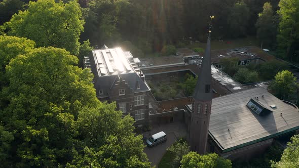 Tower Spire Of Historic Estate Broekbergen In Driebergen-Rijsenburg, Netherlands. - aerial