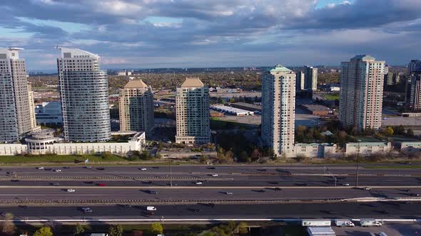 Residential growth and development along Highway 401 in Toronto, Ontario, Canada showing heavy traff