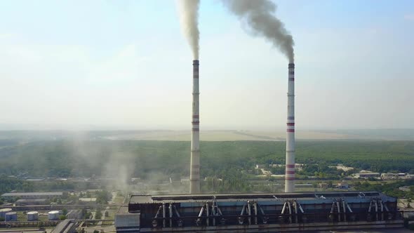 Smoking Pipes Of Thermal Power Plant. Smoke from factory chimney in an industrial plant