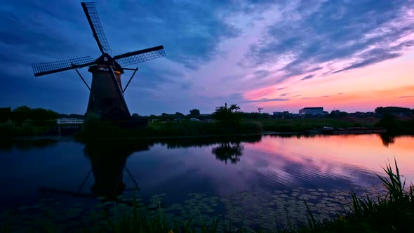 Windmills at Kinderdijk in Holland on Sunset