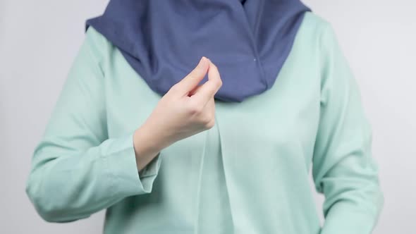 A Woman Making Hand Gesture Asking for Money