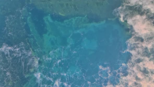 Morning Aerial View of Lake with Fog Above Water Surface and Sunrise Over Forest