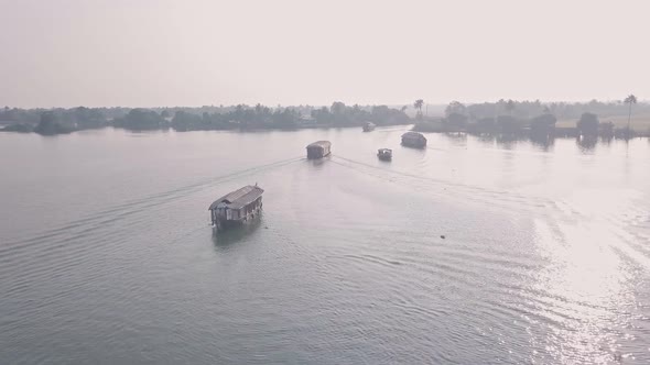 Houseboat trip in Kerala backwaters at Alleppey, India. Aerial drone view