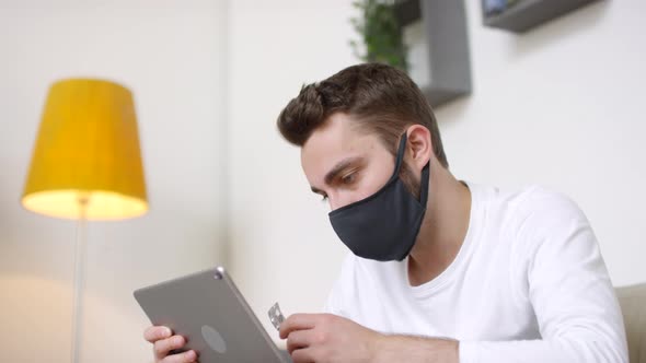 Sick Man in Face Mask Video Calling Doctor