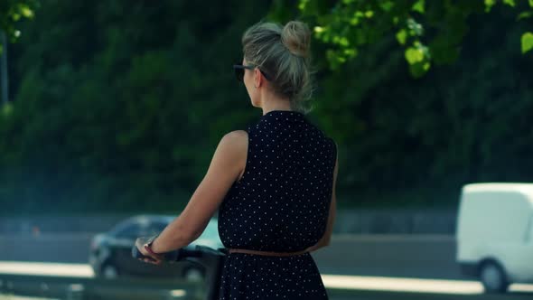 Woman Ride On Electric Scooter Mobility. Urban Riding Ecological Transport Travel.