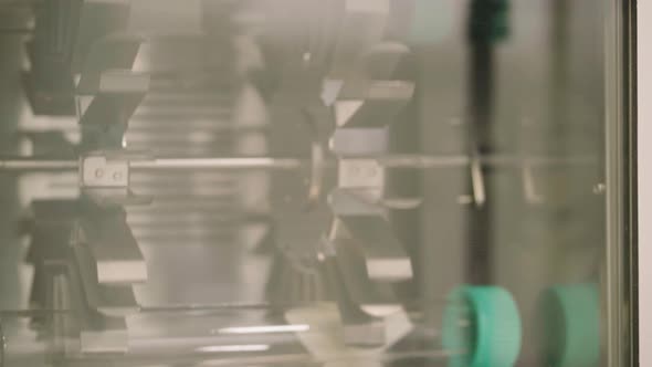 Test Tubes Inside Mixing Machine In The Biotechnology Laboratory. - close up