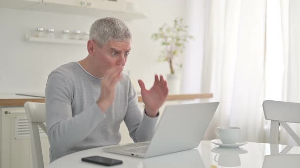 Sad Senior Old Man Having Failure on Laptop at Home