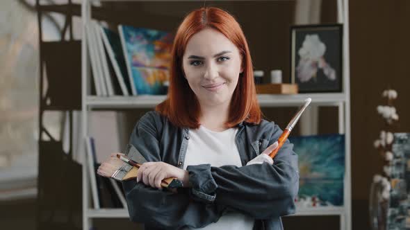 Portrait Caucasian Girl Confident Talented Artist Woman Painter with Red Hair Holding Equipment for