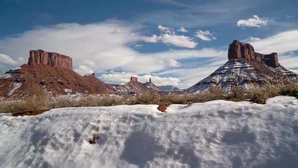Time lapse of buttes in Castle Valley Utah during winter on sunny day