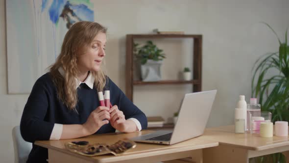 Make-Up Artist Having Video Chat On Laptop