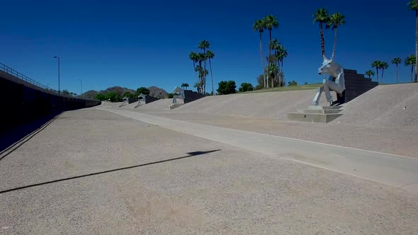 Giant 14 foot Aluminum horse sculpture divert flood waters from the Indian bend wash.