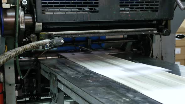 Industrial process of making envelopes in a factory