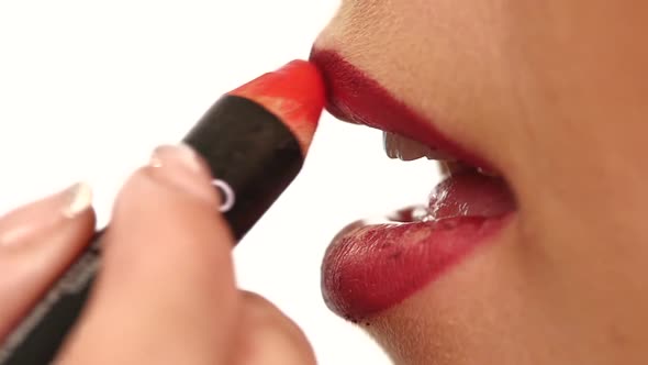 Young Woman Getting Her Makeup. Slow Motion