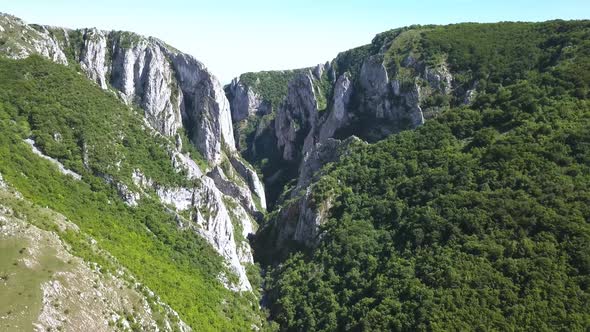 Wide, ascending aerial view of Cheile Turzii, Turda Gorge, near Transylvania. Beautiful landscape of