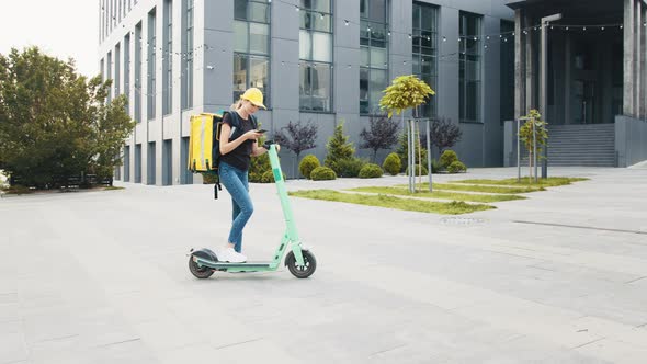 Portrait of Female Courier Food Delivery with Big Thermal Backpack on Back