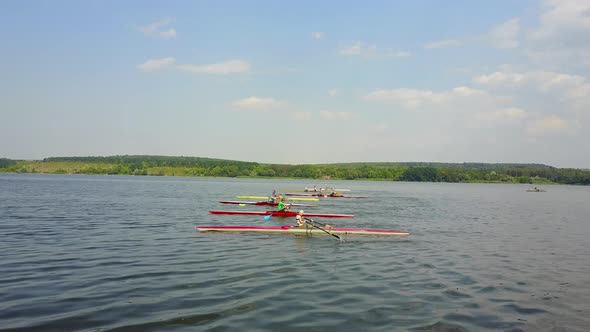 Athletes Training on Kayaks