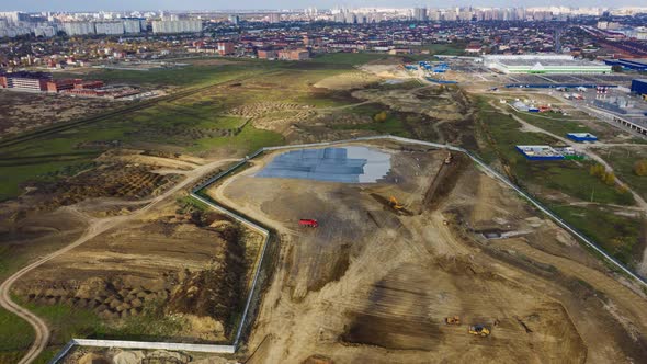 Open Ground for Shopping Mall Construction Site Aerial View