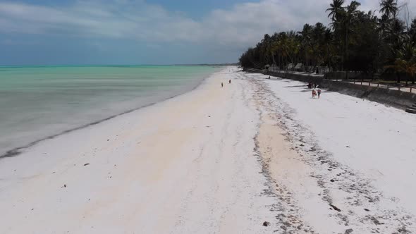 Ocean Coastline with Paradise Beach Hotels and Palm Trees Zanzibar Aerial View