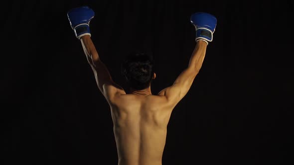 Asian Boxer Celebrating