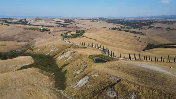 Aerial view of Val d'Orcia countryside landscape in Tuscany, Italy.