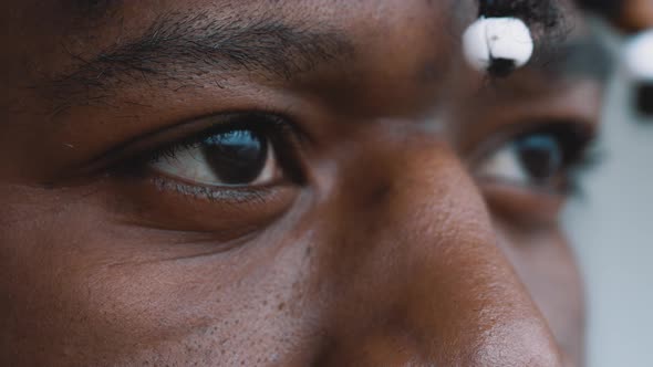 Eyes of African American Black Man with Braided Haor