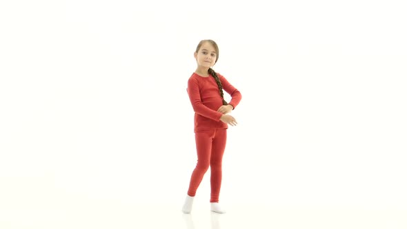 Child in Pink Thermal Underwear. White Background