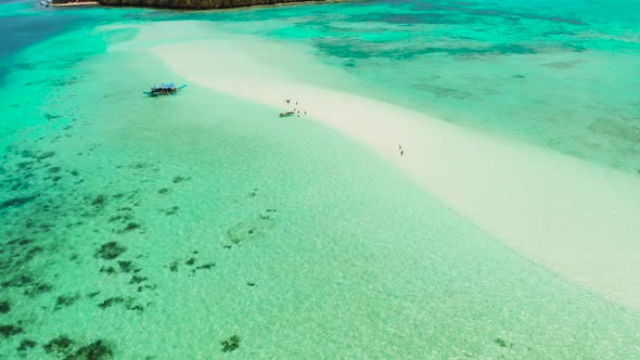 Sandy Beach in the Lagoon with Turquoise Water