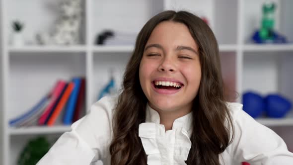 Sense of Humor of Teen Girl Laughing at Funny Joke in Classroom Emotions