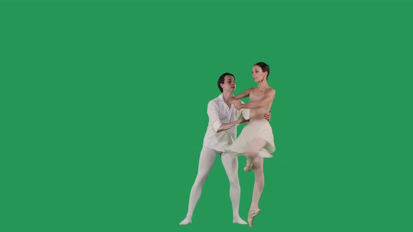 Professional Ballet Pair Practicing Moves on Green Screen