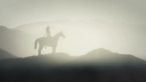 Female Warrior Sitting On A Horse In Mountains alt