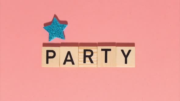 Stop Motion Animation of Wooden Letters with the Word Party Add Up