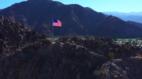 Reveal of Indio California with American flag aerial