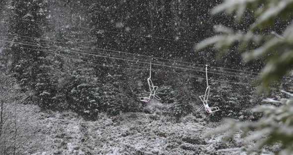 Winter Scene View of the Snowy Pine Forest and Ski Funicular in the Mountains