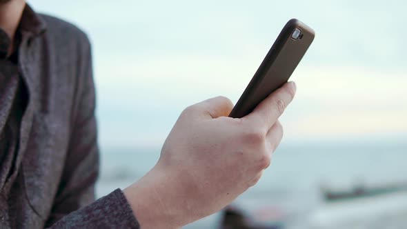 Urban Man with Smarphone in Hands