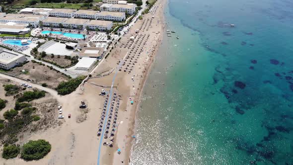 Aerial footage of the beautiful small town known as St George South, Greek city of Corfu Greece, 